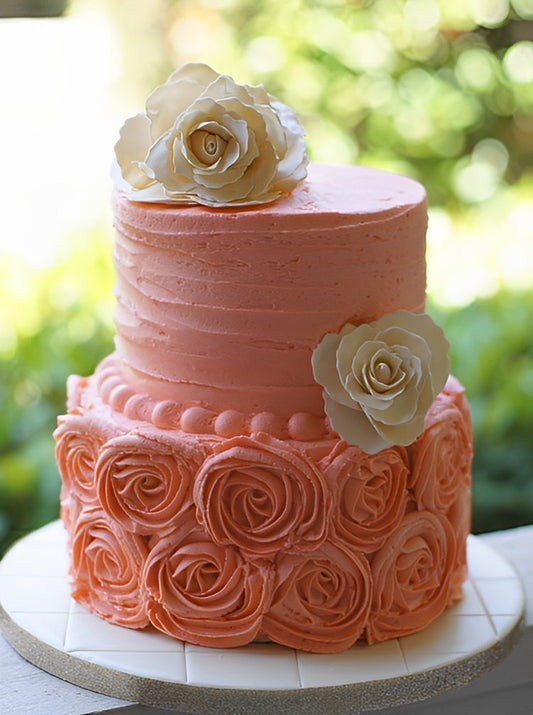 2 Tier Coral and Ivory Cake